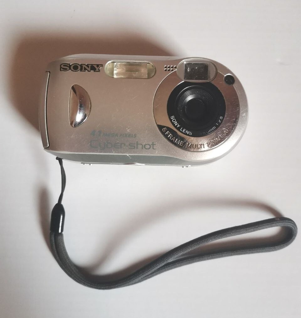 Sony CyberShot DSCP43 4.1MP Digital Camera Silver Color + Memory Card
