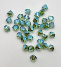 12pc Swarovski Crystal Peridot AB2X 6mm Bicone 5328 Bead