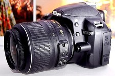 Nikon D3100 DSLR Camera with 18-55mm Lens and Lightning Card Reader Bundle