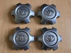 (4x) Factory OEM 2016-2021 Toyota Tacoma SR5 GRAY center caps P/N 4260B-04040