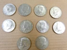 Lot of 10,  40% silver Kennedy half dollars.