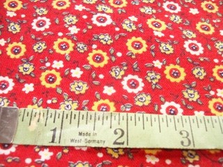 Vintage Feed Sack: Small Flowers on a Red Background