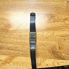 Pulsar Quartz Rectangle Gold Case Black Dial Watch Black Leather Strap