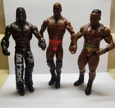 WWE LOT  TITUS O' NEIL, R-TRUTH & BIG E LANGSTON.