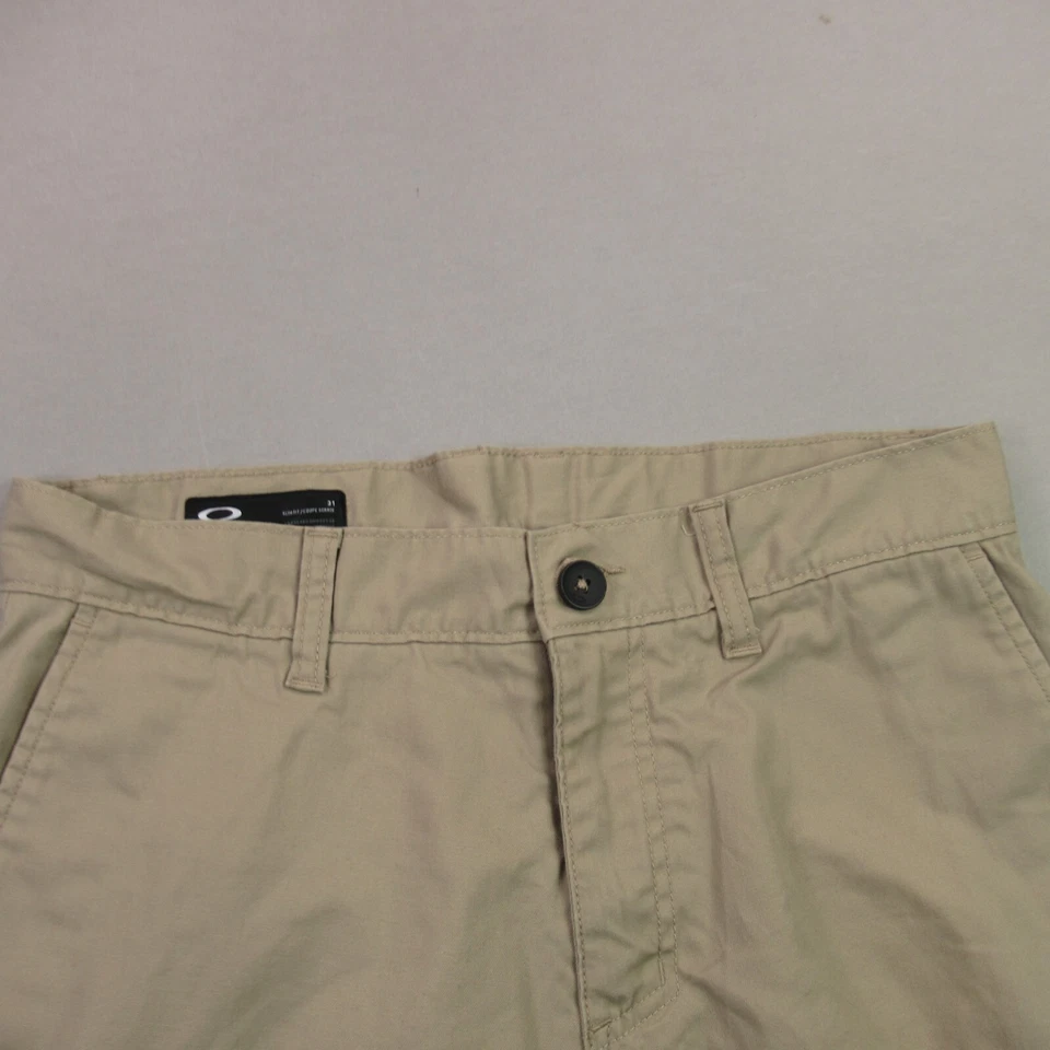 Pantalones Cortos Oakley Para Hombre 31 Bolsillos Botón Ligeros Exterior Chino Beige Calce Ajustado Foto 2 de 4