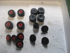 HO Scale Slot car T Jet Tuff ones 4 Sets of Wheels and Silicone Tires 2 Rd 2 Blk