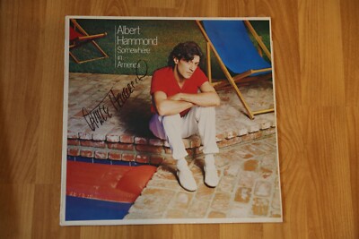 ORIGINAL Autogramm von Albert Hammond. Auf VINYL 12''. SOMEWHERE IN AMERICA
