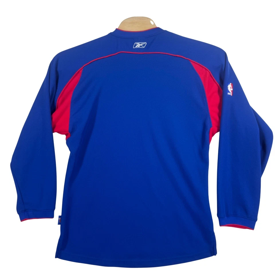 Camiseta deportiva de calentamiento de manga larga de baloncesto de la NBA Reebok Detroit Pistons para hombre M Foto 2 de 4