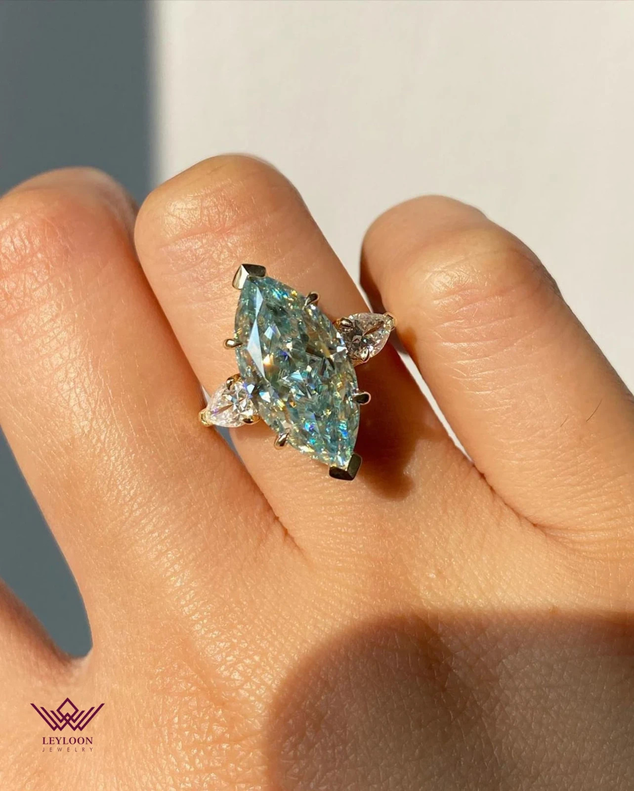 7ct Light Blue Marquise Moissanite 3-Stone Ring in 10K Gold  
