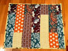 Quilted table topper or waal hanging, fabric like patched, 21x26 new