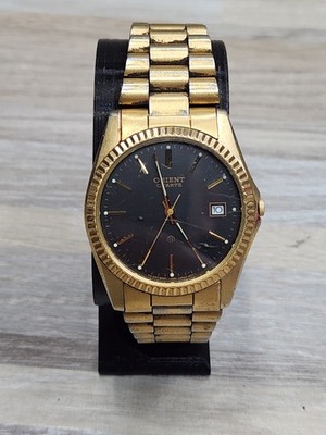 Vintage Orient Quartz Gold Tone Black Dial Men's Dress Watch NEW BATTERY