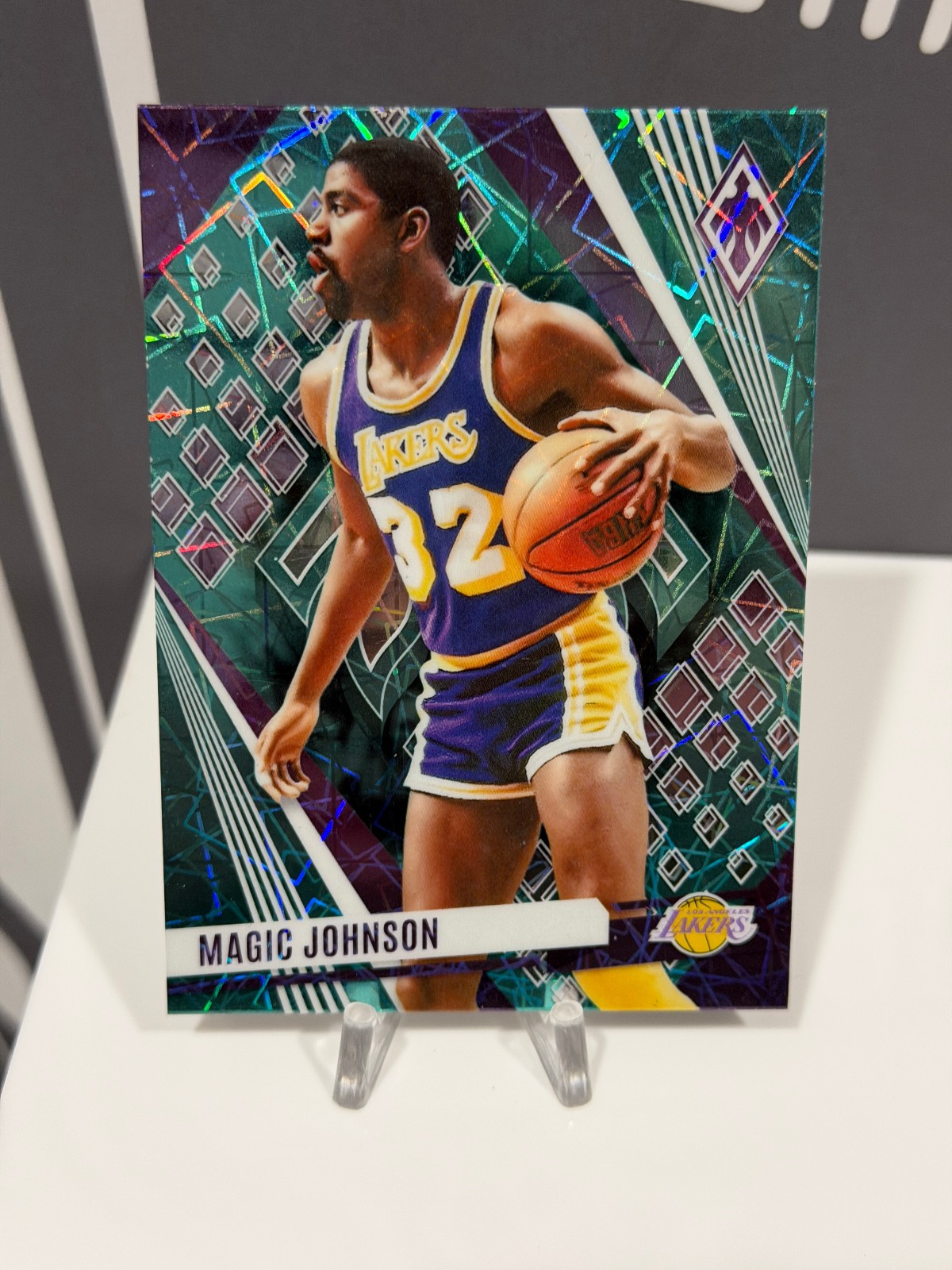 2023-24 Panini Phoenix Magic Johnson Teal Lazer Parallel #80 Los Angeles Lakers