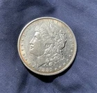 1887 O Morgan Silver Dollar $1