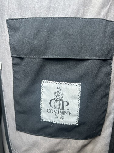 C.P. Chaqueta Company Pro-Tek Superflex Técnica Capa Exterior Negra Terrazas 48 - Imagen 10 de 14