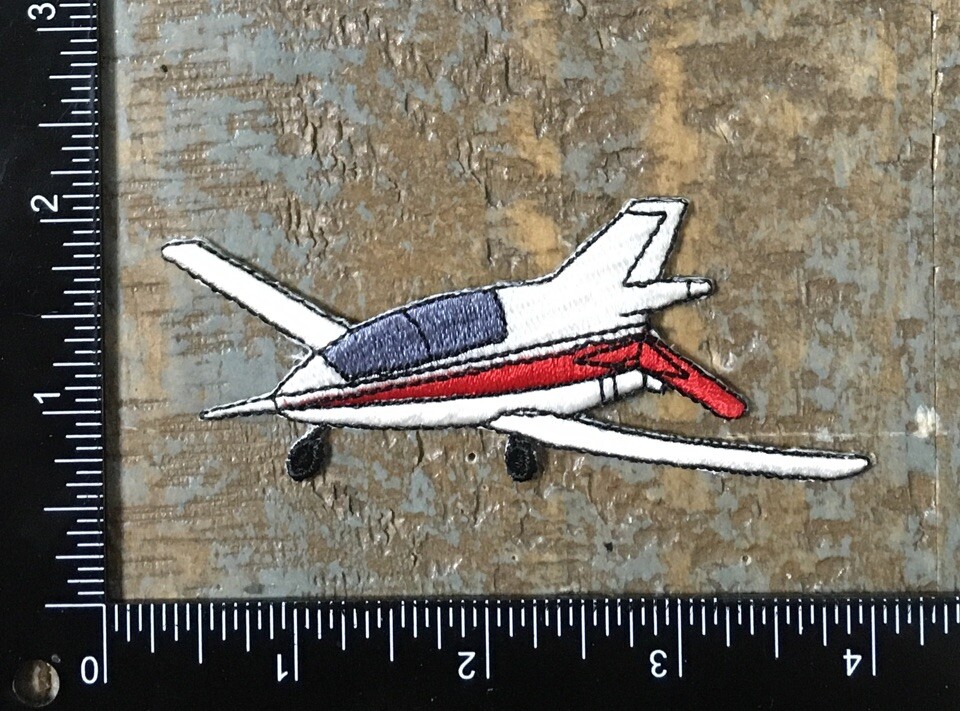 Vintage Airplane Embroidered Iron-On Patch in White and Red for Aviation Enthusiasts
