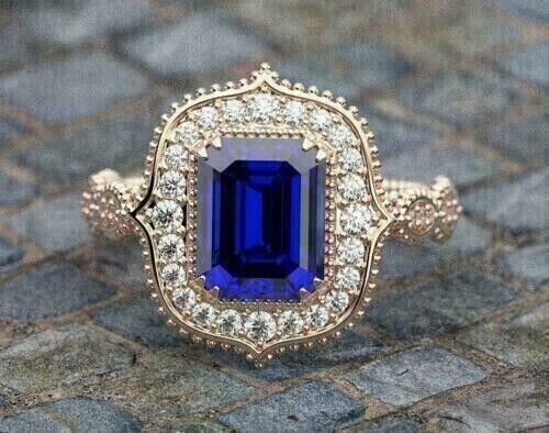 Emerald cut simulated blue sapphire ring in 14k white gold plated for women