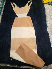 Women's Sleeveless Long Dress With Open Cut Design. Size  M