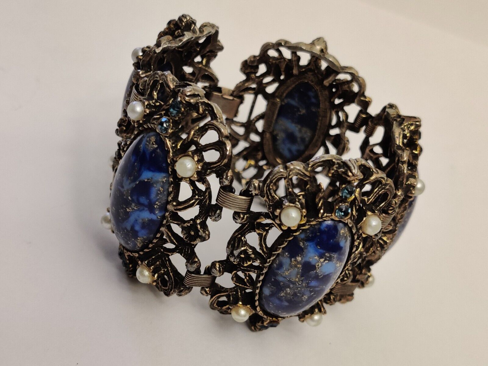 Vintage Bracelet by Carné Massive Panels Antiqued Brass Faux Lapis Cabochons 