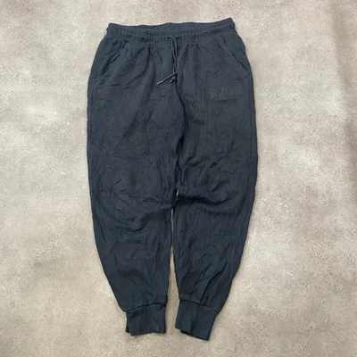 Pantalon de survêtement conique Puma Joggers pour hommes avec grand logo en r... - Photo 1/4