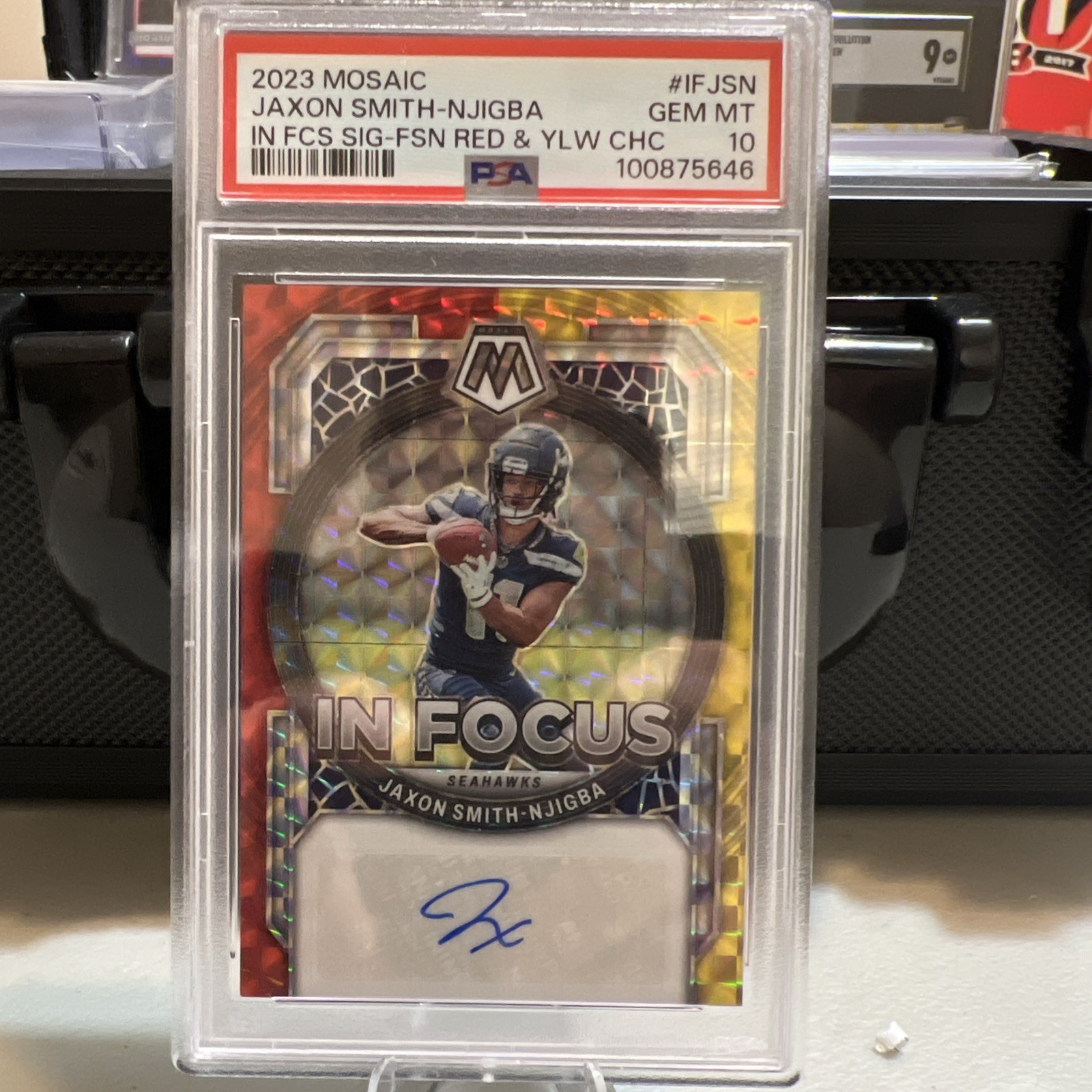 Jaxon Smith-Njigba Panini Mosaic in Focus Signature #IFJSN Fusion Red & Yellow Choice
