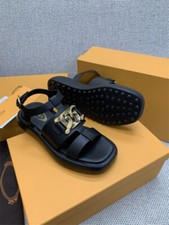 Scarpe sandali donna Tod's piatti in pelle cavi