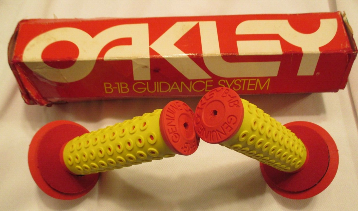 NEW OAKLEY GRIPS OG 80'S B1B RED W YELLOW + CRUD PLUGS W RED