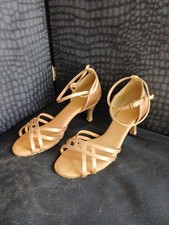 Champagne women's ballroom or Latin dance shoe with a flared heel Size 5 wide.