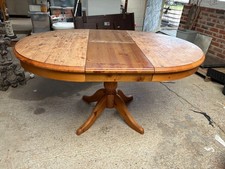 Marcoan Pedestal Dining Table Round Oval Extending Natural Brown Pine