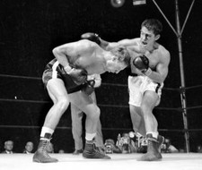 Rocky Graziano throws one of his vicious rights in the second roun .. Old Photo