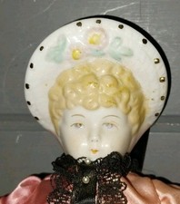 Vintage Antique China Doll Head wearing Bonnet soft body Very Pretty