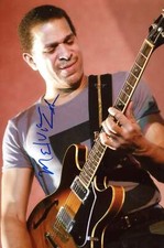 Melvin Taylor JAZZ GUITARIST autograph, In-Person signed photo