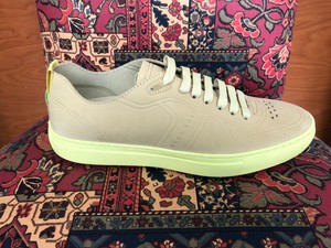 pastel yellow trainers