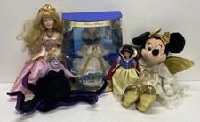Ursula, Snow White, Minnie Assorted Disney dolls