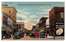 BROWNWOOD, TEXAS - BUSY CENTER AVENUE SHOWING McLEAN STUDIO - LINEN POSTCARD
