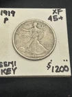 KEY 1919-P Walking Liberty Half Dollar XF+/AU. Full bodice and breast definition