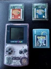 Atomic Purple GBC Bundle Pokémon Crystal + Zelda Oracle of Ages & Seasons