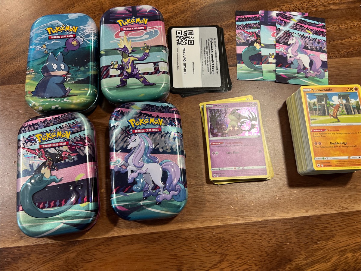 how many pokemon cards in a tin Lot of 4 - Mini Tins And Codes and Quaquaval ex have evolved to take the stage with mesmerizing magic Buy Pokémon Trading Card Game