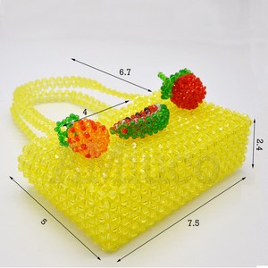 yellow beaded bag