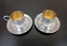Deux tasses et leurs sous-tasses en argent mass