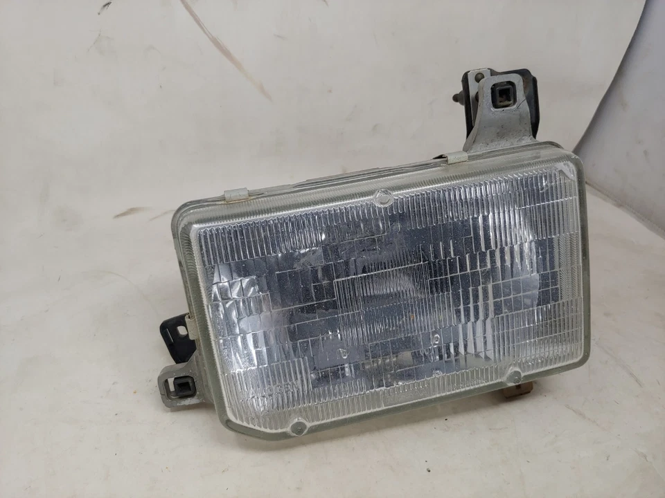 Faro lado izquierdo del conductor OEM 1987 88 89 90 91 92 93 94 95 Nissan Pathfinder Foto 2 de 4
