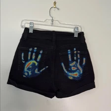 Black thermal handprint painted denim shorts