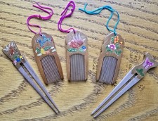 A set of 5 Wooden Painted Chinese Hair Dressing Combs and Pins