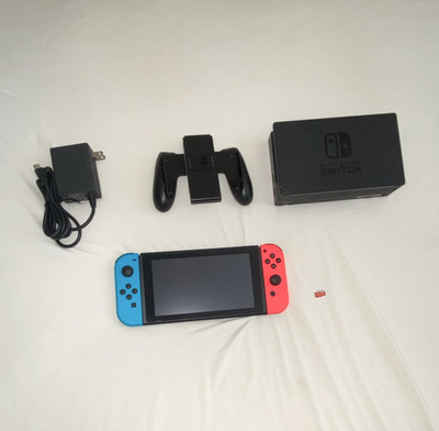 Original Nintendo Switch Console, 64 GB SD, Red/Blue Joy-Cons, Charger Dock