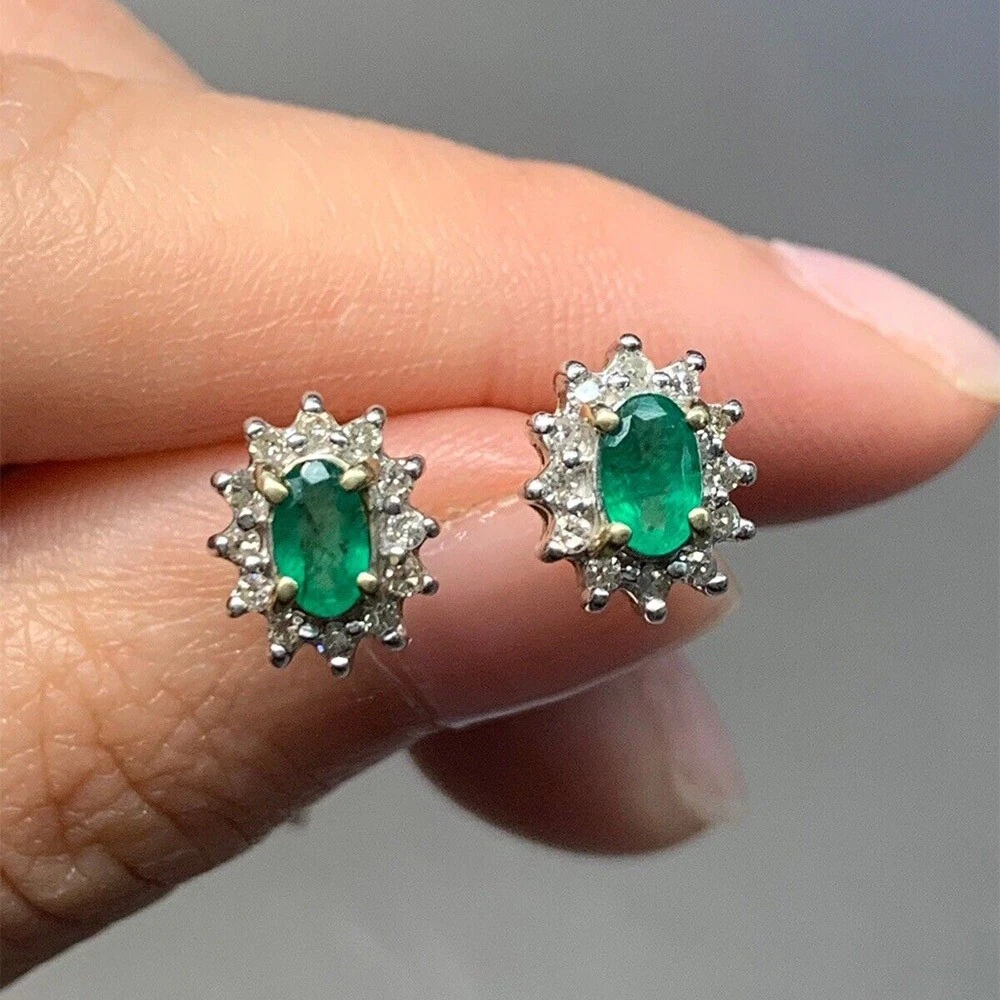 Oval halo on sale diamond earrings
