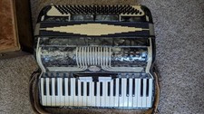 Enrico Roselli Vintage Accordion Italian Craftsmanship with Sheet Music and Case