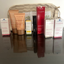 Clarins Travel Size Facial Skincare Set Eye Care Day/Night Cream Scrub Oil SPF15