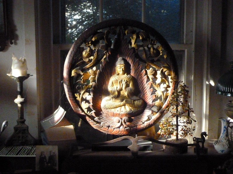 A Thai Carved Buddha on Stand
