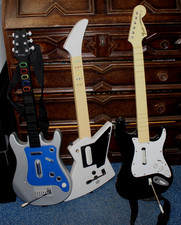 2 NINTENDO WII/1 XBOX ROCK BAND 3/3 DIFFERENT GUITAR CONTROLLERS- FENDER STRAT 2