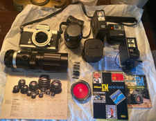 Nikon Nikkormat FT2 35mm SLR Film Camera w/SOLIGOR Auto-Zoom 1:4.5 f 90mm-230mm