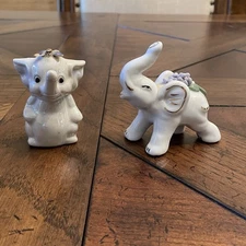 Pair of Elephant Figurines White Porcelain Gold Trim Butterfly and Floral Accent